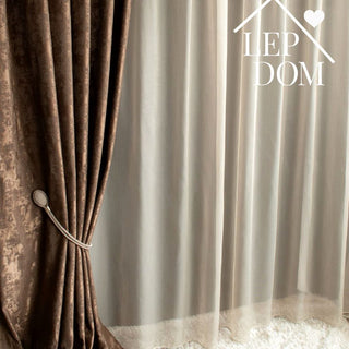 Zavese i draperi za dnevnu sobu: Kako odabrati pravi stil za vaš prostor